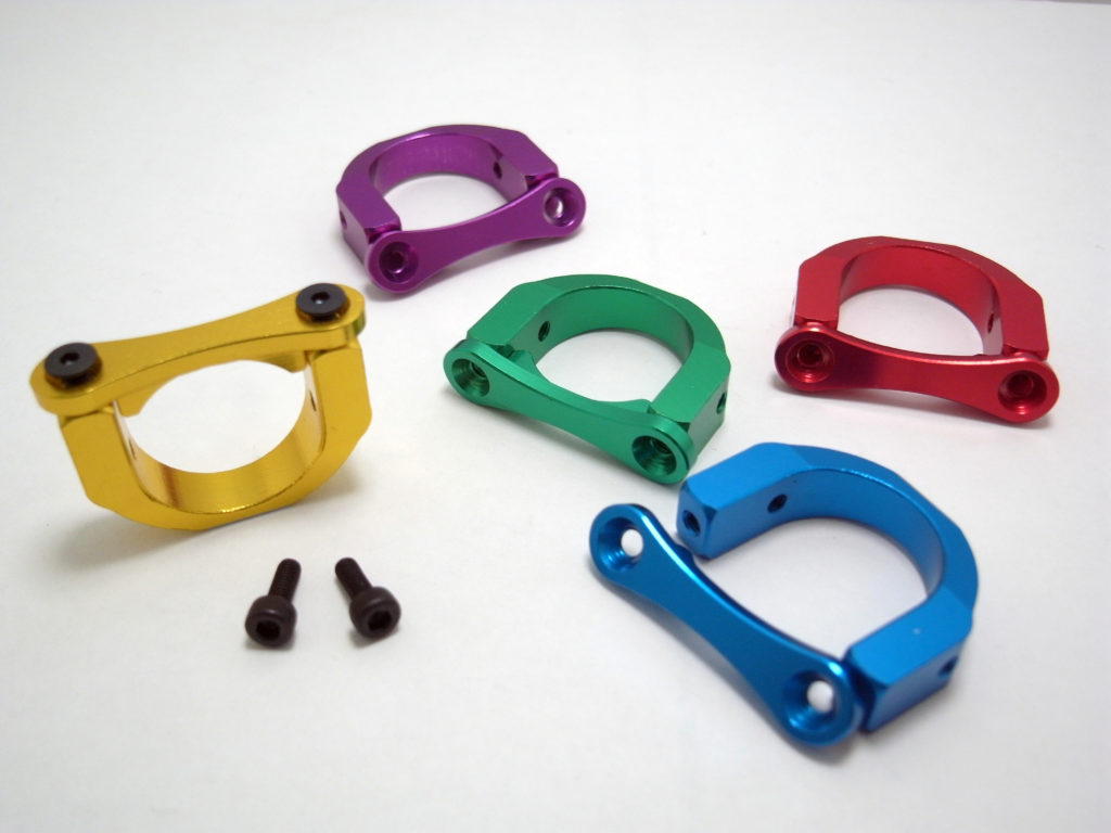 Aluminium metal cnc parts color Anodized isolated on white